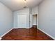 Neutral bedroom with hardwood flooring, spacious closets and ample natural light at 7001 Interbay Blvd # 121, Tampa, FL 33616