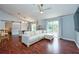 Inviting living room with hardwood floors, modern furnishings, and access to a private balcony at 7001 Interbay Blvd # 121, Tampa, FL 33616