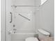 Clean bathroom with shower and tub combination, and accessibility features at 20115 Nob Oak Ave, Tampa, FL 33647