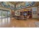 An inviting clubhouse lounge with decorative features, comfortable seating, and large windows for natural light at 20115 Nob Oak Ave, Tampa, FL 33647