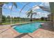 Relax in your screened in pool, with views of the lake; this home is perfect for outdoor living at 20115 Nob Oak Ave, Tampa, FL 33647