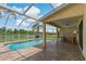 Enjoy outdoor living by your own screened in pool and patio area, with water views at 20115 Nob Oak Ave, Tampa, FL 33647