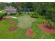 A putting green with multiple holes and landscaping offering a fun recreational amenity for residents at 20115 Nob Oak Ave, Tampa, FL 33647