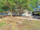 Charming single-Gathering home with a covered carport at 2101 E Ellicott St, Tampa, FL 33610