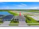 Beautiful home showcasing a three car garage and manicured landscaping at 2743 Winding Creek Trl, North Port, FL 34289