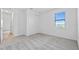 Inviting bedroom with a window, closet, and soft carpet for a cozy retreat at 2743 Winding Creek Trl, North Port, FL 34289