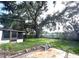Well-sized backyard featuring a patio area and lawn space, perfect for recreation at 3234 37Th N St, St Petersburg, FL 33713