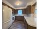 A functional kitchen features a white refrigerator and ample counter space for meal preparation at 3234 37Th N St, St Petersburg, FL 33713