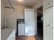 Laundry area featuring a washer and dryer hookup and a door leading to the kitchen at 3234 37Th N St, St Petersburg, FL 33713