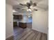 Bright living room with ceiling fan, flowing to the kitchen and dining area, perfect for gatherings at 3234 37Th N St, St Petersburg, FL 33713