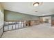 Renovated living area showing removed drywall and exposed studs, ready for customization at 3921 E Eden Roc Cir, Tampa, FL 33634