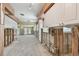 Unfurnished interior space exhibiting exposed framing and views leading to a pool through large windows at 3921 E Eden Roc Cir, Tampa, FL 33634
