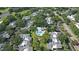 Overhead shot of the neighborhood with lush landscaping and an outdoor pool at 4104 Northmeadow Cir # 4104, Tampa, FL 33618