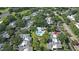 Aerial view of the community including a pool and lush landscaping at 4104 Northmeadow Cir # 4104, Tampa, FL 33618