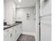Clean bathroom with double vanity, granite countertop, and minimalist decor at 4104 Northmeadow Cir # 4104, Tampa, FL 33618