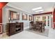 Dining area with stylish table and chairs, modern lighting, and a built-in buffet cabinet at 4104 Northmeadow Cir # 4104, Tampa, FL 33618