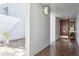 Stylish entryway featuring tiled floors, a modern light fixture, and a view of an open courtyard at 4104 Northmeadow Cir # 4104, Tampa, FL 33618