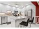 Contemporary kitchen with white cabinets, granite countertops, stainless steel appliances and center island at 4104 Northmeadow Cir # 4104, Tampa, FL 33618