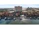 An aerial view of the real estate property on the water with a community pool and boat docks at 4900 Brittany S Dr # 1011, St Petersburg, FL 33715