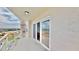 Spacious balcony featuring views of the city and the water and a glass sliding door at 4900 Brittany S Dr # 1011, St Petersburg, FL 33715