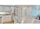 A modern kitchen with stainless steel appliances and ample countertop space at 4900 Brittany S Dr # 1011, St Petersburg, FL 33715