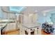 Spacious kitchen with stainless steel appliances, a center island, and custom cabinets at 4900 Brittany S Dr # 1011, St Petersburg, FL 33715