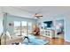 A modern, stylish living room with water views and access to an outdoor balcony at 4900 Brittany S Dr # 1011, St Petersburg, FL 33715