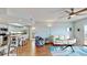 Open concept living area with modern kitchen, dining area, and comfortable seating at 4900 Brittany S Dr # 1011, St Petersburg, FL 33715