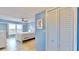 Bright bedroom with a ceiling fan, a full bed and large windows at 4900 Brittany S Dr # 1011, St Petersburg, FL 33715