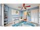 Cozy office space with a desk and an ocean-themed rug at 4900 Brittany S Dr # 1011, St Petersburg, FL 33715