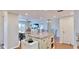 An open concept living space combining the kitchen, dining and living area for seamless flow at 4900 Brittany S Dr # 1011, St Petersburg, FL 33715