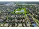 Extensive aerial view of the community, capturing the scenic ponds and well-planned streets at 12218 Avondale Oak Pl, Riverview, FL 33578
