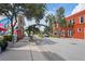 Street view of downtown district with Defending Freedom landmark and unique architecture at 1980 Tahitian Pl # 10, Dunedin, FL 34698
