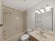 Bathroom featuring a shower and bathtub combination and a vanity at 3964 Dream Oak Pl # 203, Tampa, FL 33613