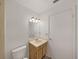 Bathroom featuring a single sink vanity and toilet at 3964 Dream Oak Pl # 203, Tampa, FL 33613