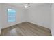 Bedroom with natural light and wood floors at 3964 Dream Oak Pl # 203, Tampa, FL 33613