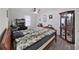 Bedroom with ceiling fan, natural light, and hardwood floors at 3964 Dream Oak Pl # 203, Tampa, FL 33613