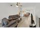 Open concept living room flows into the dining area at 3964 Dream Oak Pl # 203, Tampa, FL 33613
