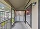Screened in porch with full-sized washer and dryer and exterior view at 3964 Dream Oak Pl # 203, Tampa, FL 33613