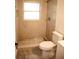 Modern bathroom featuring a walk-in shower with glass doors and updated fixtures at 4720 Murray Hill Dr, Tampa, FL 33615
