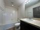 Bathroom featuring a shower/tub combo, toilet and sink at 8819 Walnut Gable Ct, Riverview, FL 33578