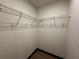 A corner closet with metal shelves at 8819 Walnut Gable Ct, Riverview, FL 33578