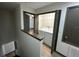Upstairs landing with laundry room and linen closet at 8819 Walnut Gable Ct, Riverview, FL 33578