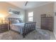 Bedroom with a neutral color scheme, cozy rug, and ample natural light at 9016 Falcon Ct, Venice, FL 34293