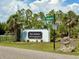 Lake Geraldine community entrance sign showcasing lush landscaping and a welcoming environment for residents and visitors at 9016 Falcon Ct, Venice, FL 34293