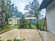 Spacious backyard featuring outbuildings for ample storage and functional outdoor space at 10928 Echo Loop, New Port Richey, FL 34654