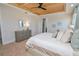 Main bedroom with wood ceiling and dresser at 7814 Hidden Creek Loop # 104, Lakewood Ranch, FL 34202
