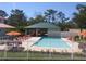 Refreshing community pool with plenty of seating at 7814 Hidden Creek Loop # 104, Lakewood Ranch, FL 34202