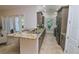 Modern kitchen with granite countertops and stainless steel appliances at 7814 Hidden Creek Loop # 104, Lakewood Ranch, FL 34202