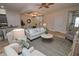 Bright living room featuring a comfy sofa and stylish coffee table at 7814 Hidden Creek Loop # 104, Lakewood Ranch, FL 34202